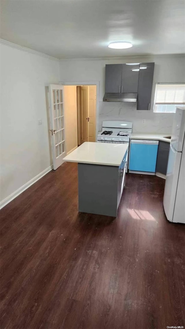 kitchen featuring white appliances, gray cabinets, and dark wood-type flooring