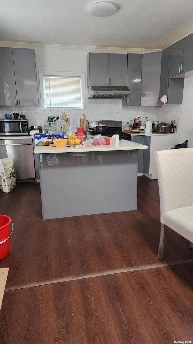 48-27 213th St, Bayside, NY 11364 - kitchen with gray cabinetry, custom range hood, gas stove, light countertops, and a kitchen island