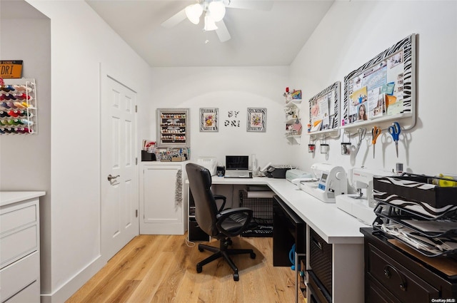 office space with ceiling fan and light hardwood / wood-style floors