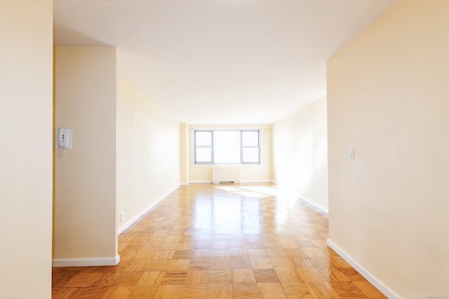 spare room featuring light parquet flooring