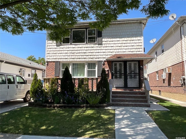 view of front of house with a front lawn