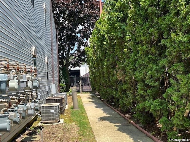 view of property exterior featuring central air condition unit