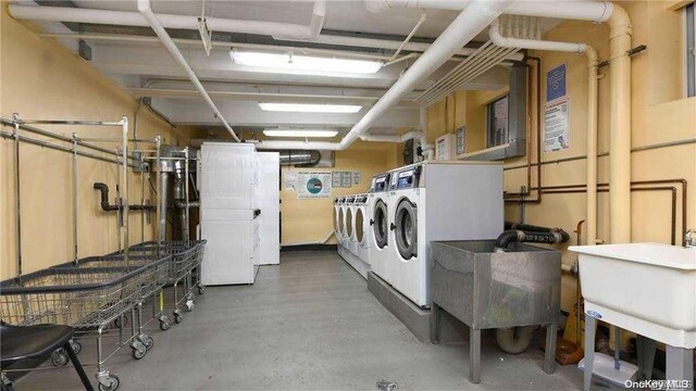 63-60 102nd St Unit D9, Rego Park, NY 11374 - shared laundry room featuring independent washer and dryer