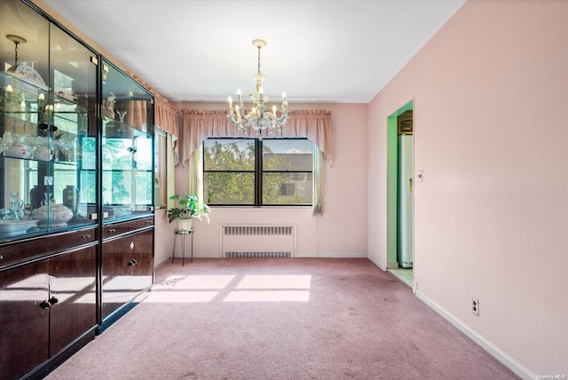 interior space with radiator heating unit, light colored carpet, and a chandelier