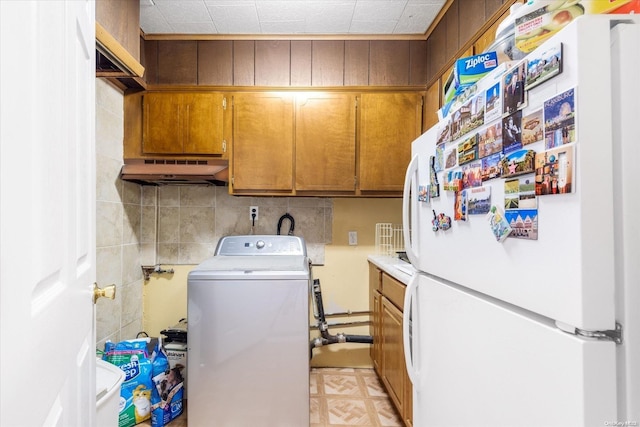 laundry room featuring washer / dryer