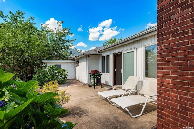 view of patio / terrace with a grill