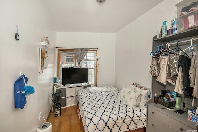 bedroom featuring dark wood-type flooring