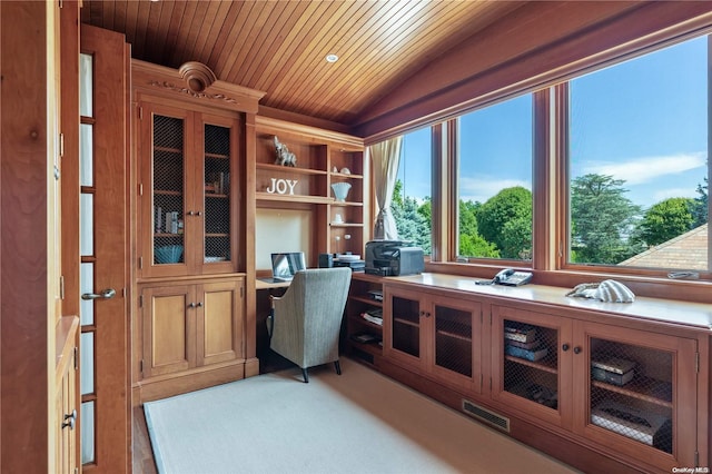 home office featuring wooden ceiling, lofted ceiling, and light hardwood / wood-style floors