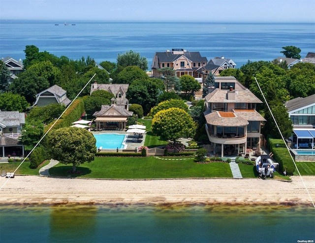 birds eye view of property featuring a water view