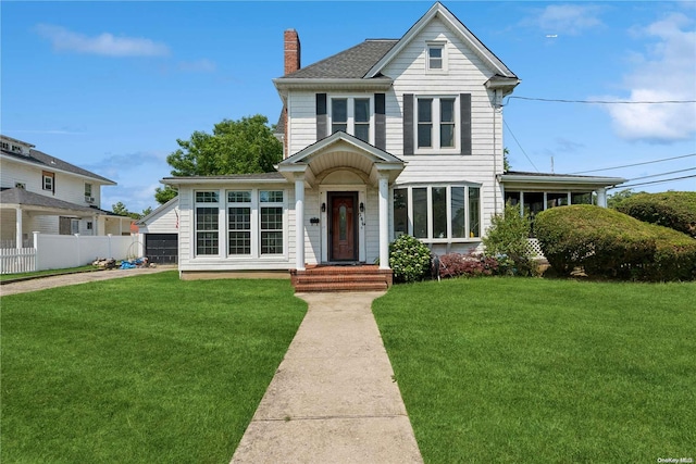 view of front of property with a front lawn