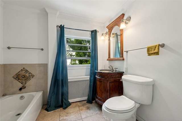 bathroom with tile patterned floors, vanity, crown molding, toilet, and a bathing tub