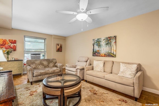 living room with parquet flooring, ceiling fan, and cooling unit