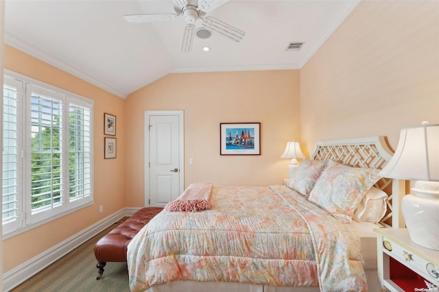 bedroom with carpet flooring, ceiling fan, crown molding, and lofted ceiling