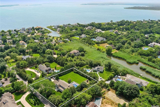 drone / aerial view with a water view