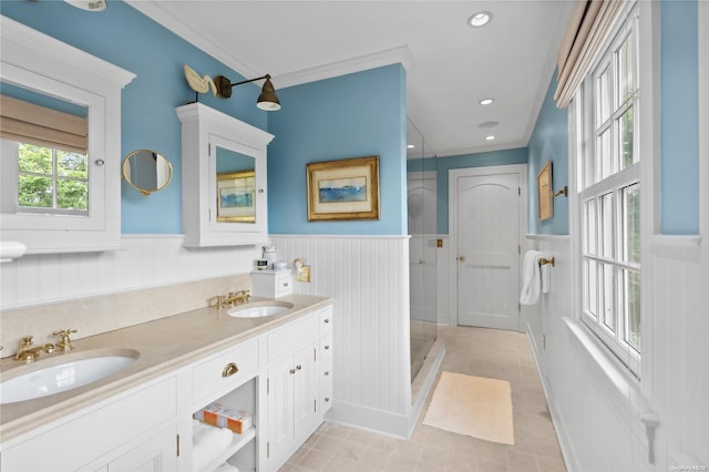 bathroom featuring vanity and ornamental molding