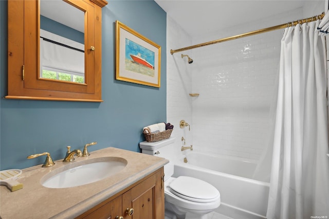 full bathroom featuring shower / bath combo with shower curtain, vanity, and toilet