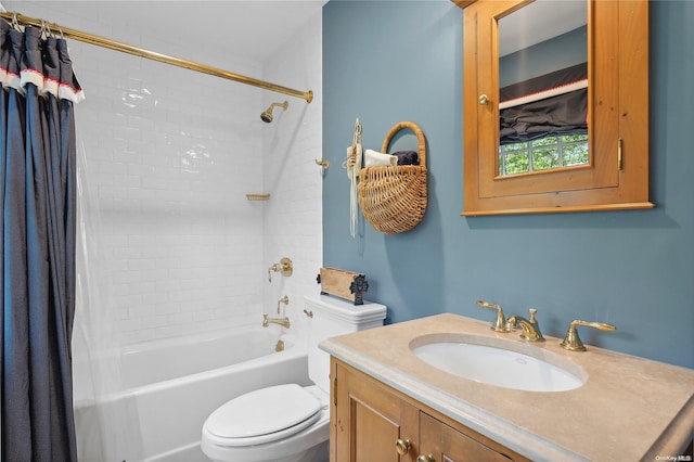 full bathroom with vanity, shower / bath combo, and toilet