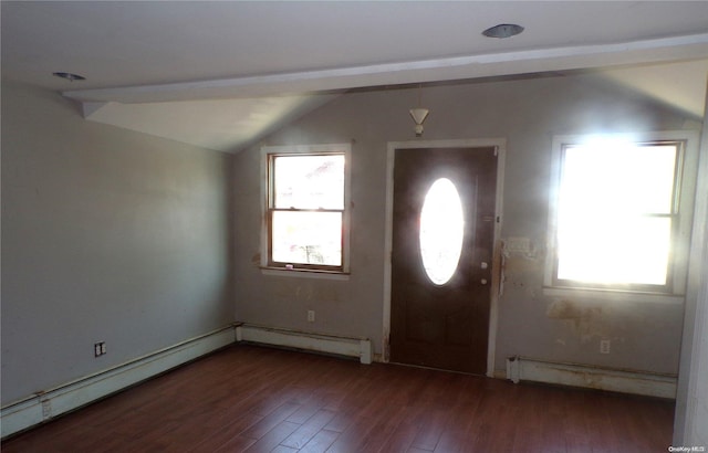 foyer with a baseboard heating unit, dark hardwood / wood-style flooring, a wealth of natural light, and vaulted ceiling