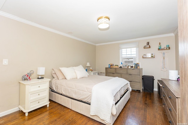 bedroom featuring crown molding and dark wood-type flooring