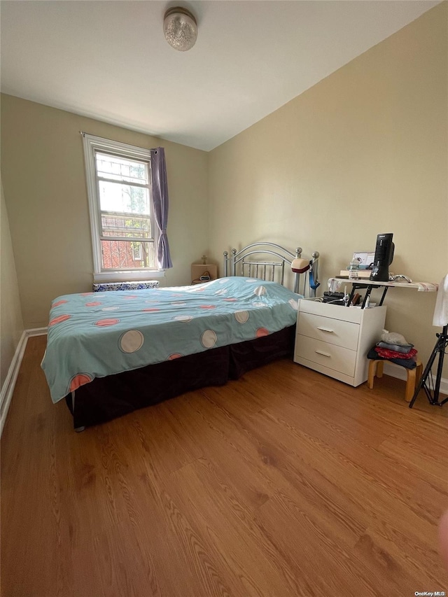 bedroom featuring light wood-type flooring