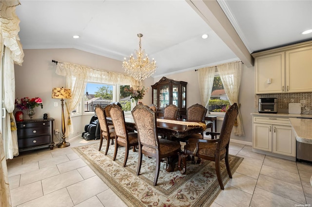 tiled dining space with a chandelier, crown molding, and a healthy amount of sunlight