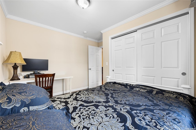 carpeted bedroom with crown molding and a closet