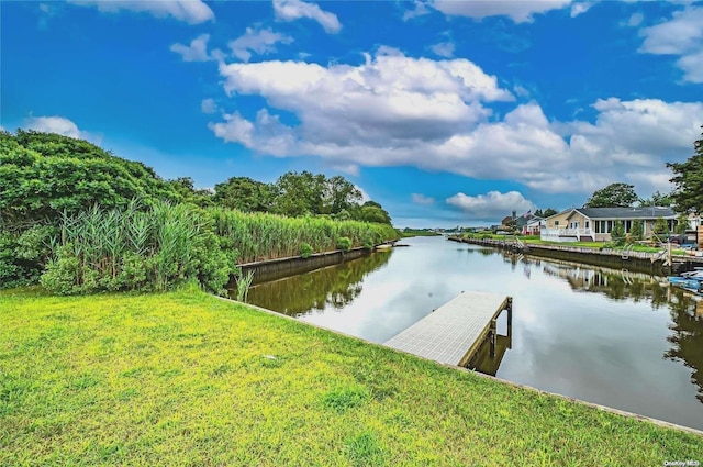 4 Landing Ln, Southampton, NY 11968 - dock area featuring a water view and a yard