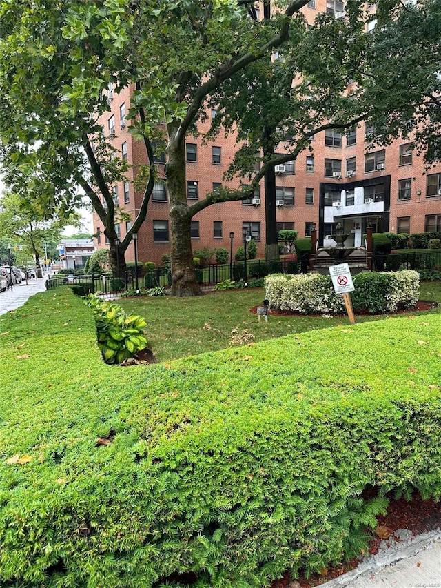 view of community with a lawn