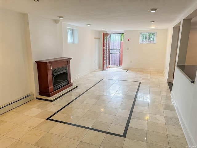 unfurnished living room featuring light tile patterned floors and a baseboard radiator