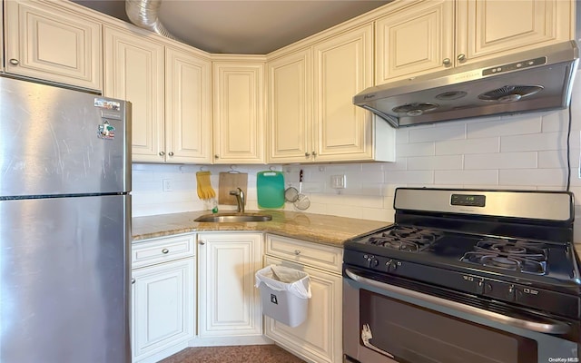 kitchen with light stone countertops, backsplash, ventilation hood, stainless steel appliances, and sink