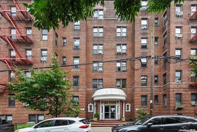 view of building exterior featuring cooling unit