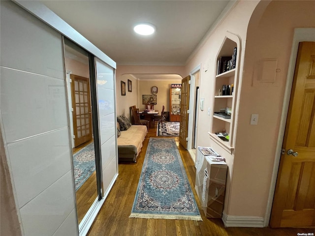 hall featuring dark wood-type flooring