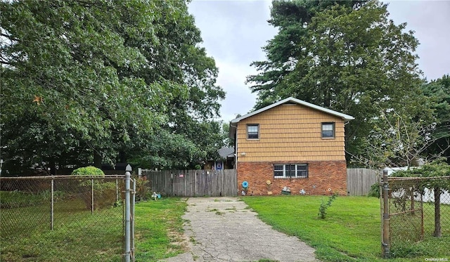 view of home's exterior featuring a yard