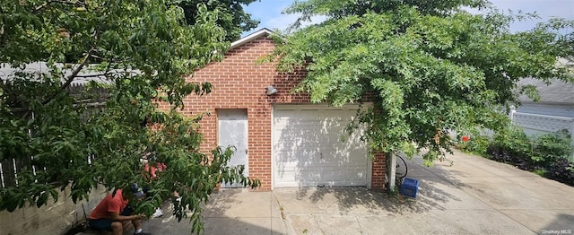 view of side of property featuring a garage