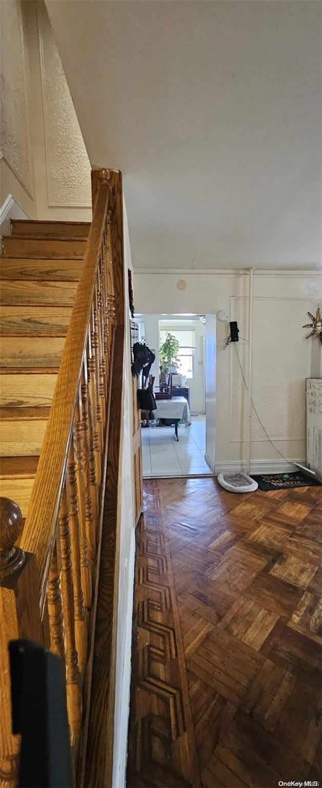 stairs with parquet flooring