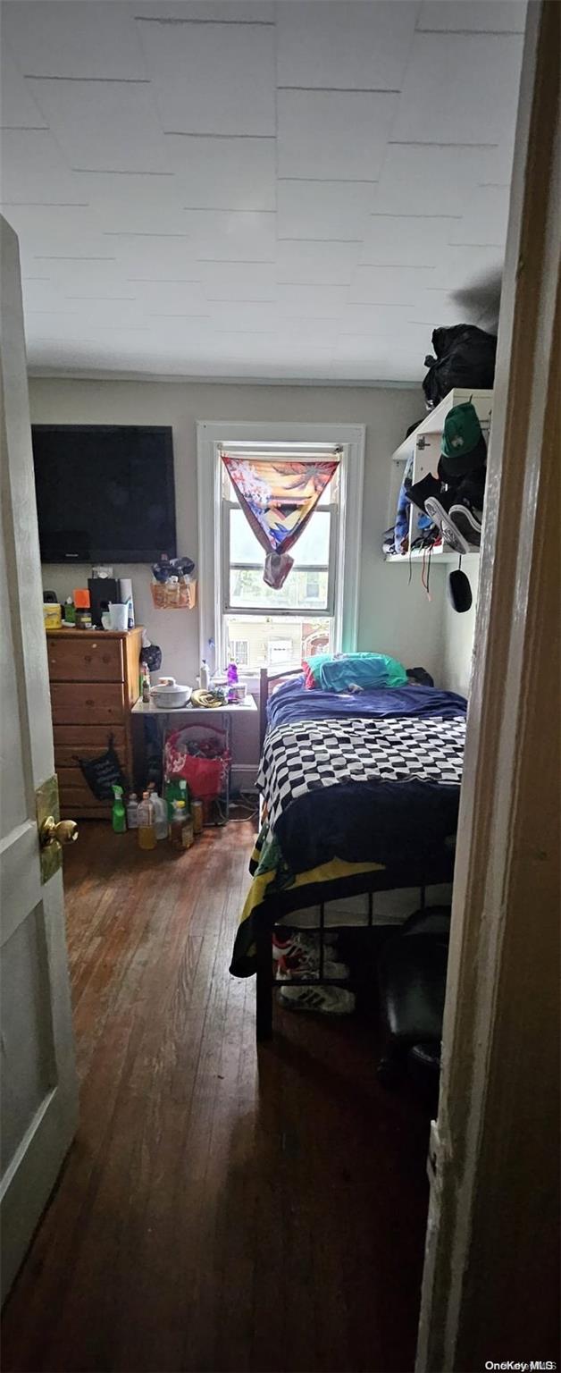 bedroom featuring hardwood / wood-style flooring