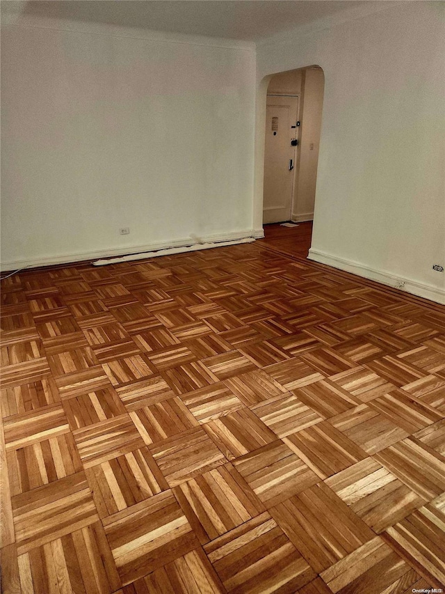 spare room with light parquet floors