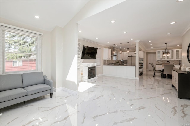 living room with ornamental molding