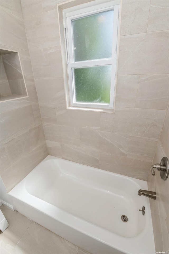 bathroom with tile patterned floors