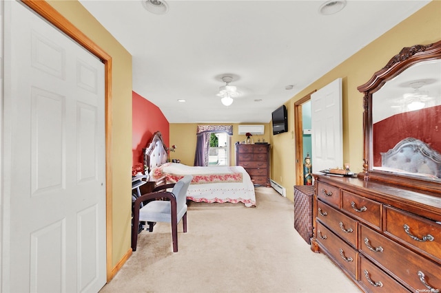 carpeted bedroom with baseboard heating, ceiling fan, and an AC wall unit