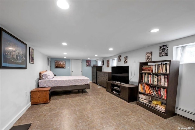 bedroom featuring a baseboard radiator