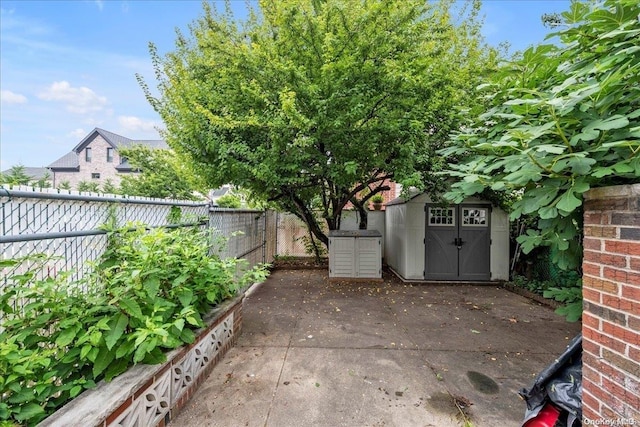 view of patio with a shed