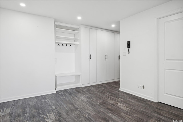 mudroom with dark hardwood / wood-style floors