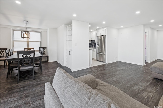 living room featuring dark hardwood / wood-style floors