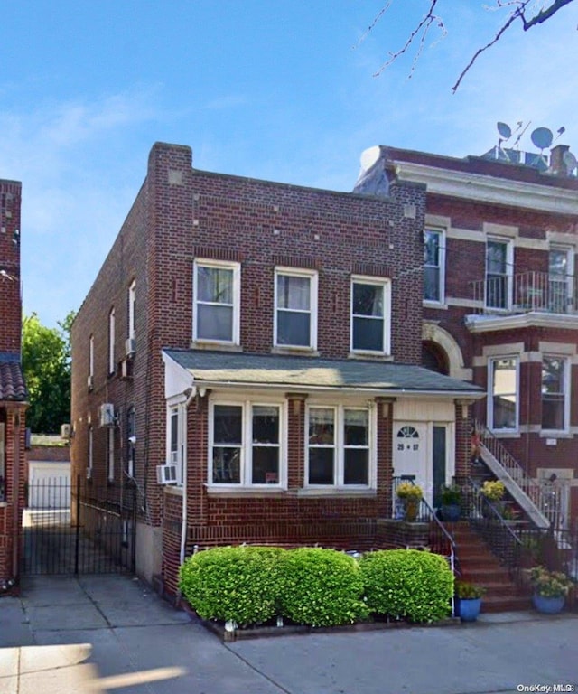 view of front facade with cooling unit