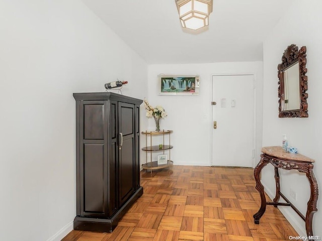 interior space with light parquet floors