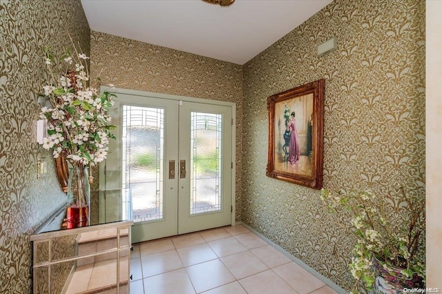 1233 Beech St Unit 35, Atlantic Beach, NY 11509 - entryway featuring french doors, wallpapered walls, and light tile patterned floors