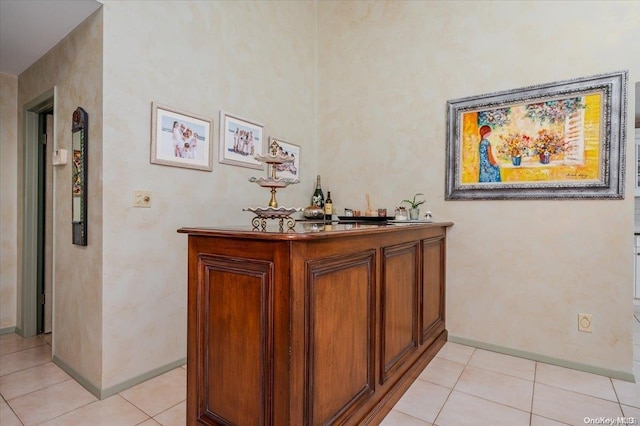 1233 Beech St Unit 35, Atlantic Beach, NY 11509 - indoor dry bar featuring baseboards and light tile patterned floors
