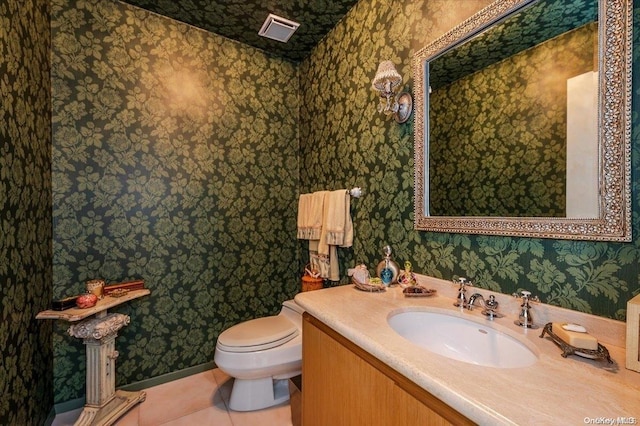 1233 Beech St Unit 35, Atlantic Beach, NY 11509 - half bath with wallpapered walls, toilet, vanity, tile patterned floors, and baseboards