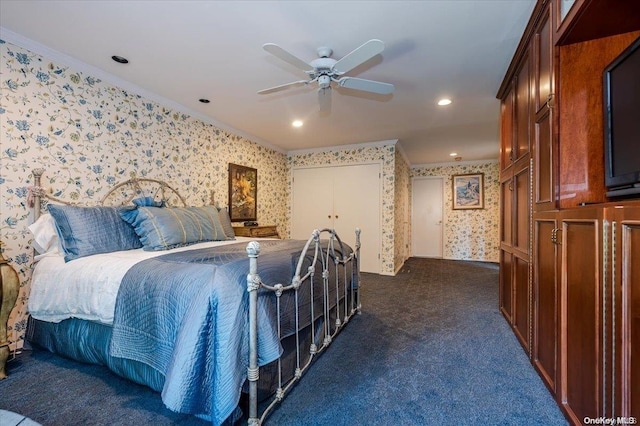 carpeted bedroom with ceiling fan and ornamental molding